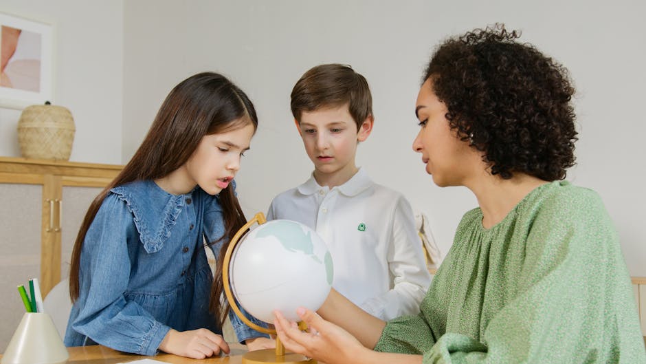 A teacher and two children exploring a globe indoors, fostering learning and curiosity.